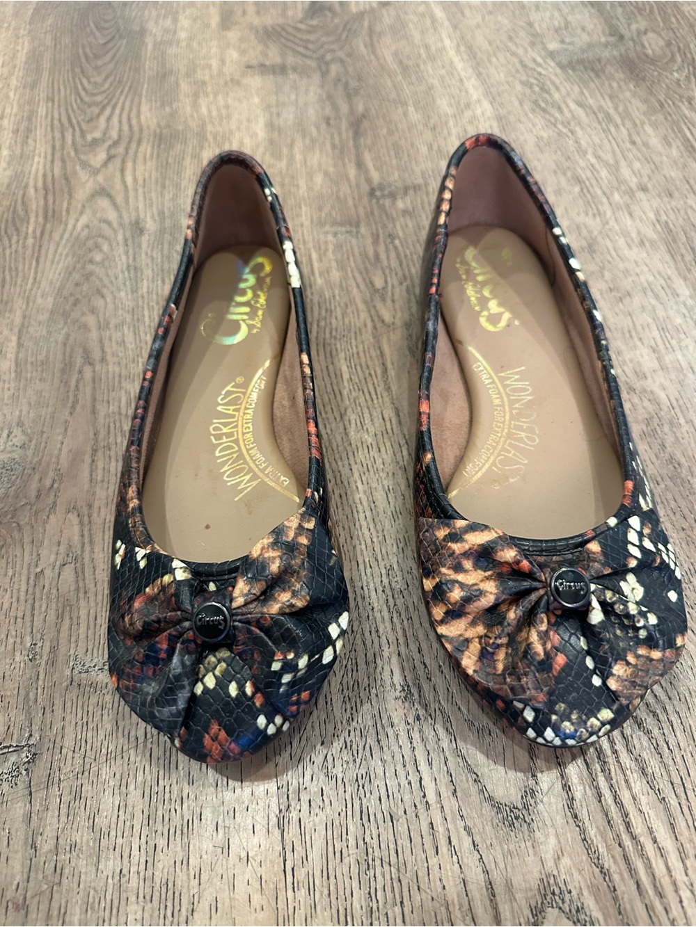 Circus by Sam Edelman Snake-Print Ballet Flats in Black and Tan